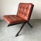 Scandinavian folding armchair in cognac leather