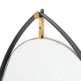 Vintage mirror with a metal and brass frame, 1950s.