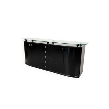 Postmodern buffet in black lacquer with a glass top on ball feet.