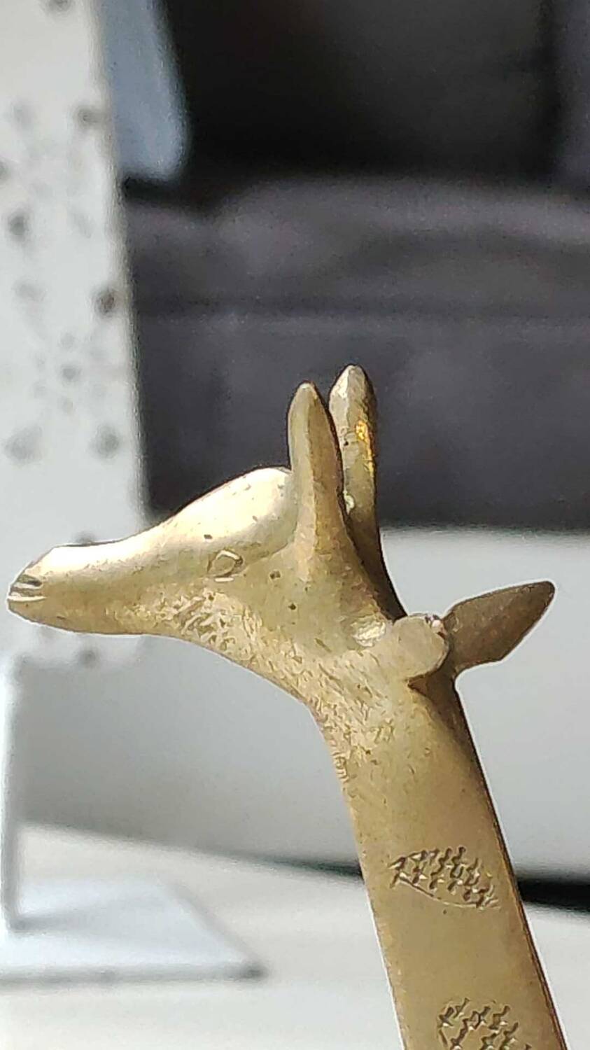 African giraffe figurine in polished brass. high 20 cm