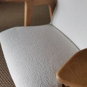 Scandinavian armchairs by Roger Landault in white.