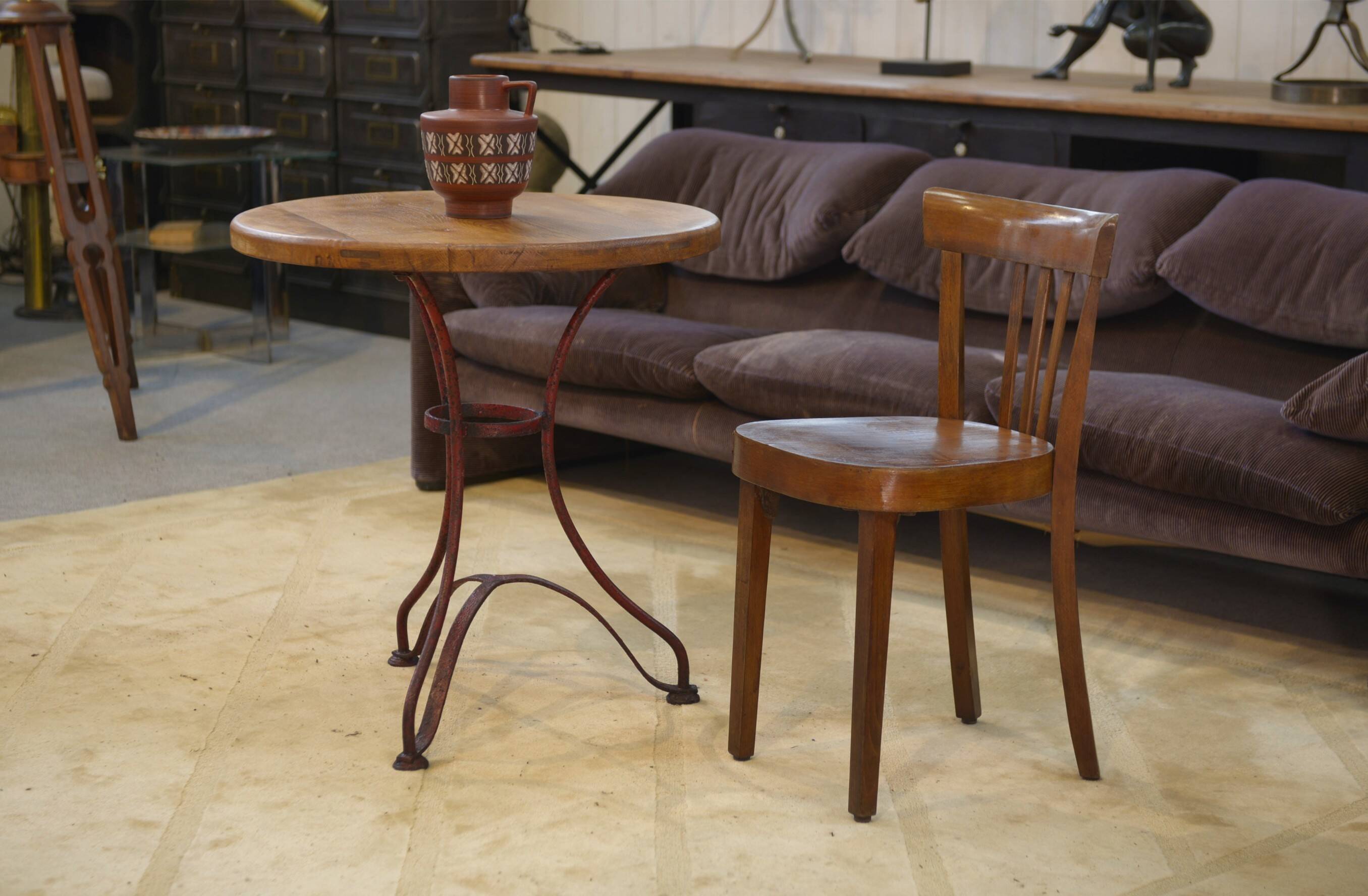 Patinated bistro table with an oak top from the 1950s.