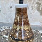 Glass lamp base with dried flowers