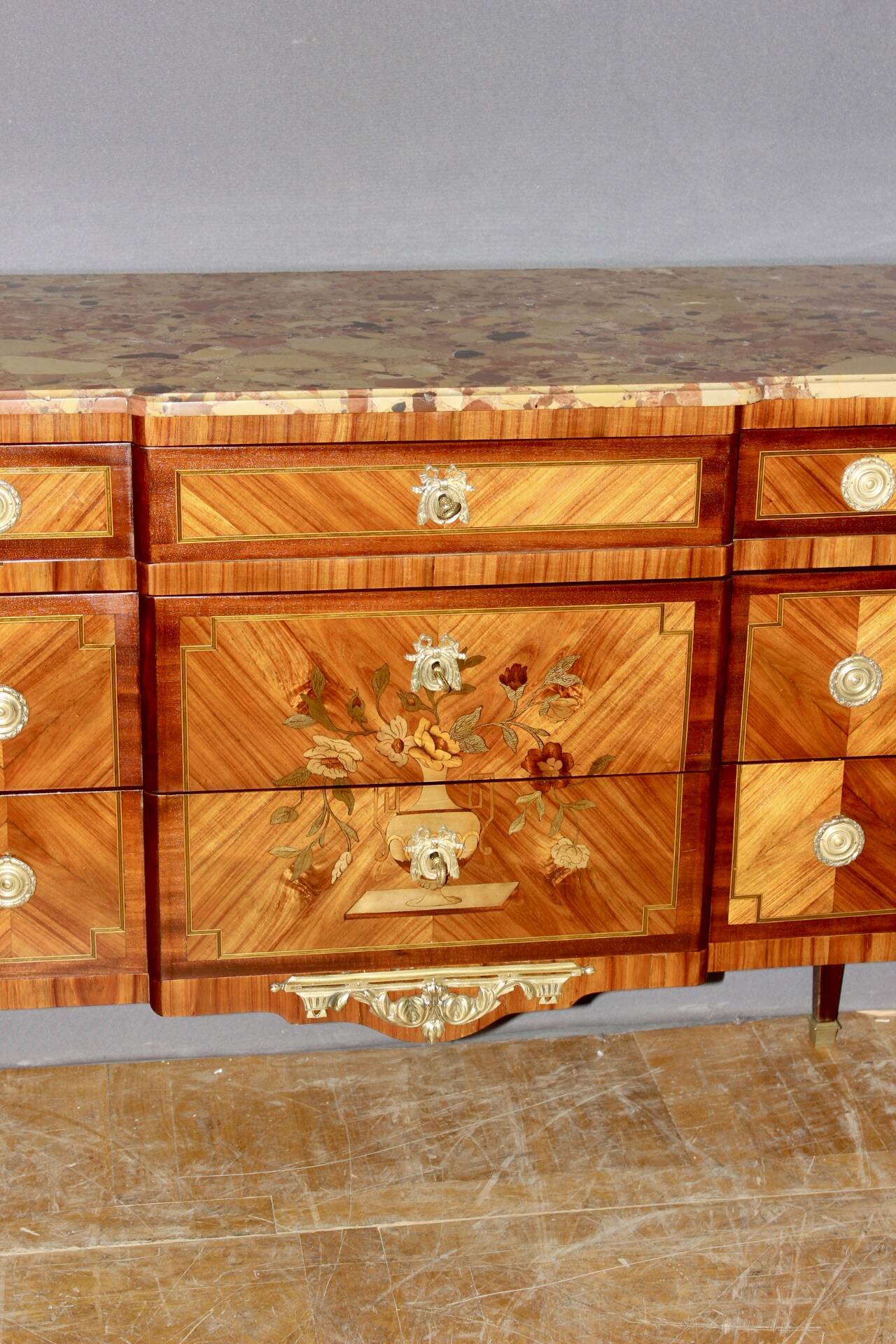 Louis XVI style commode in marquetry from around 1940.