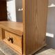 Wall shelf in raw wood with drawers and openwork hearts