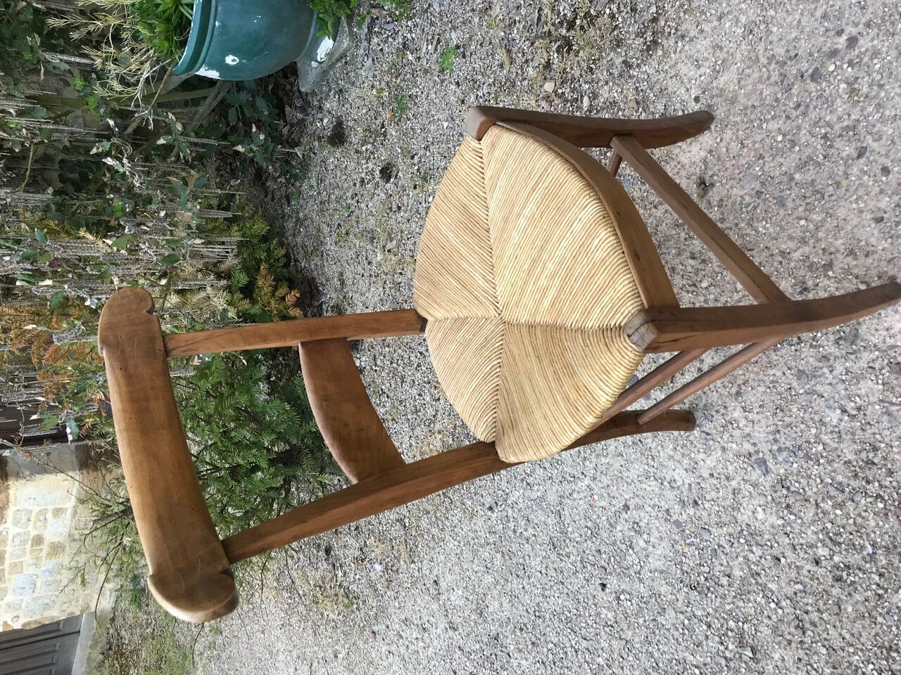 Solid oak table with 3 extension cords, 6 oak chairs with straw seat