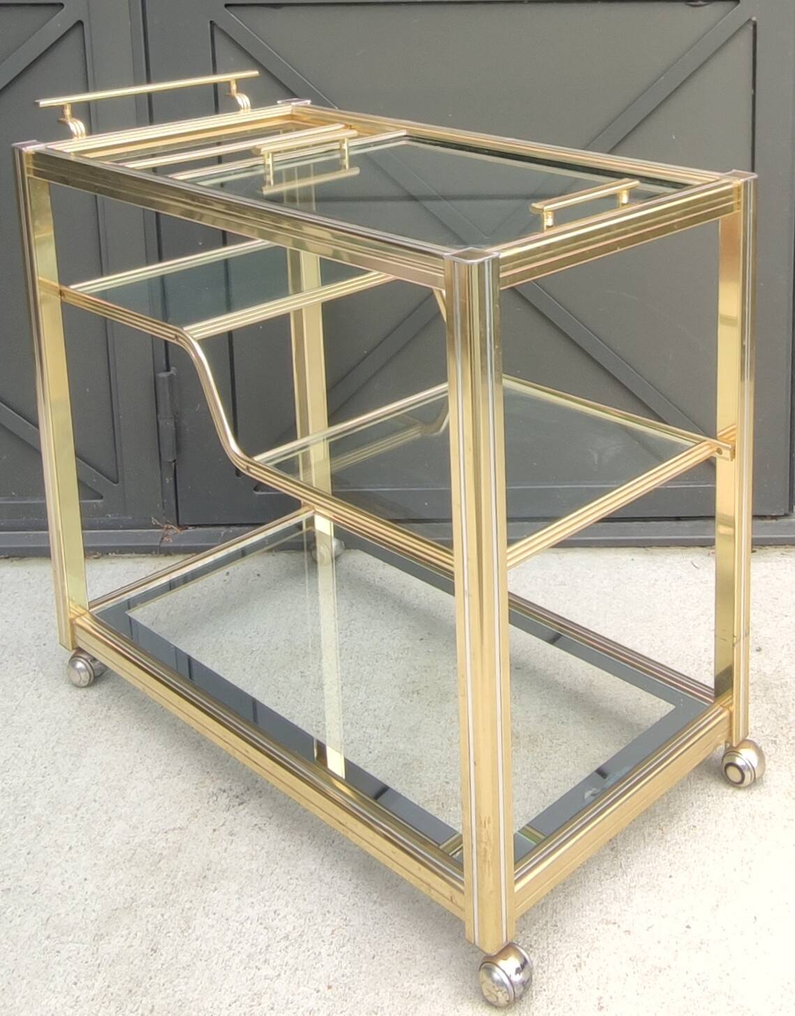 Rolling bar cart, gold-tone metal design, 1970s