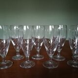 Eight champagne flutes in engraved glass