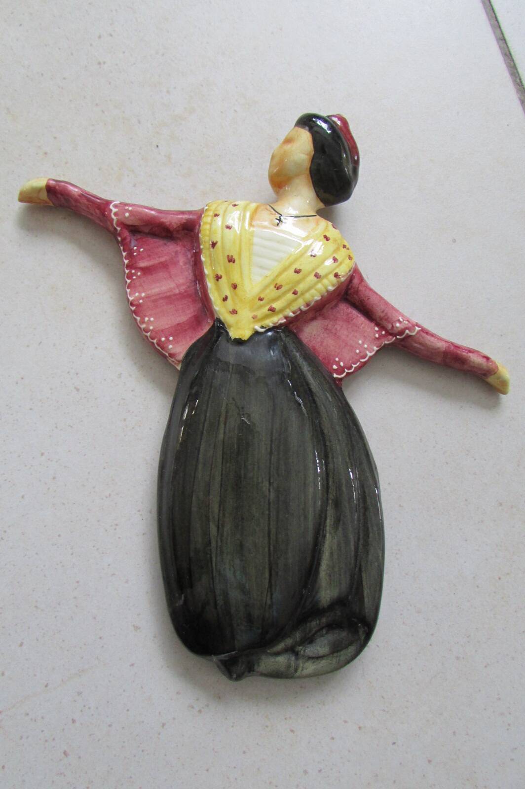 Couple of ceramic wall-mounted Arlesiennes