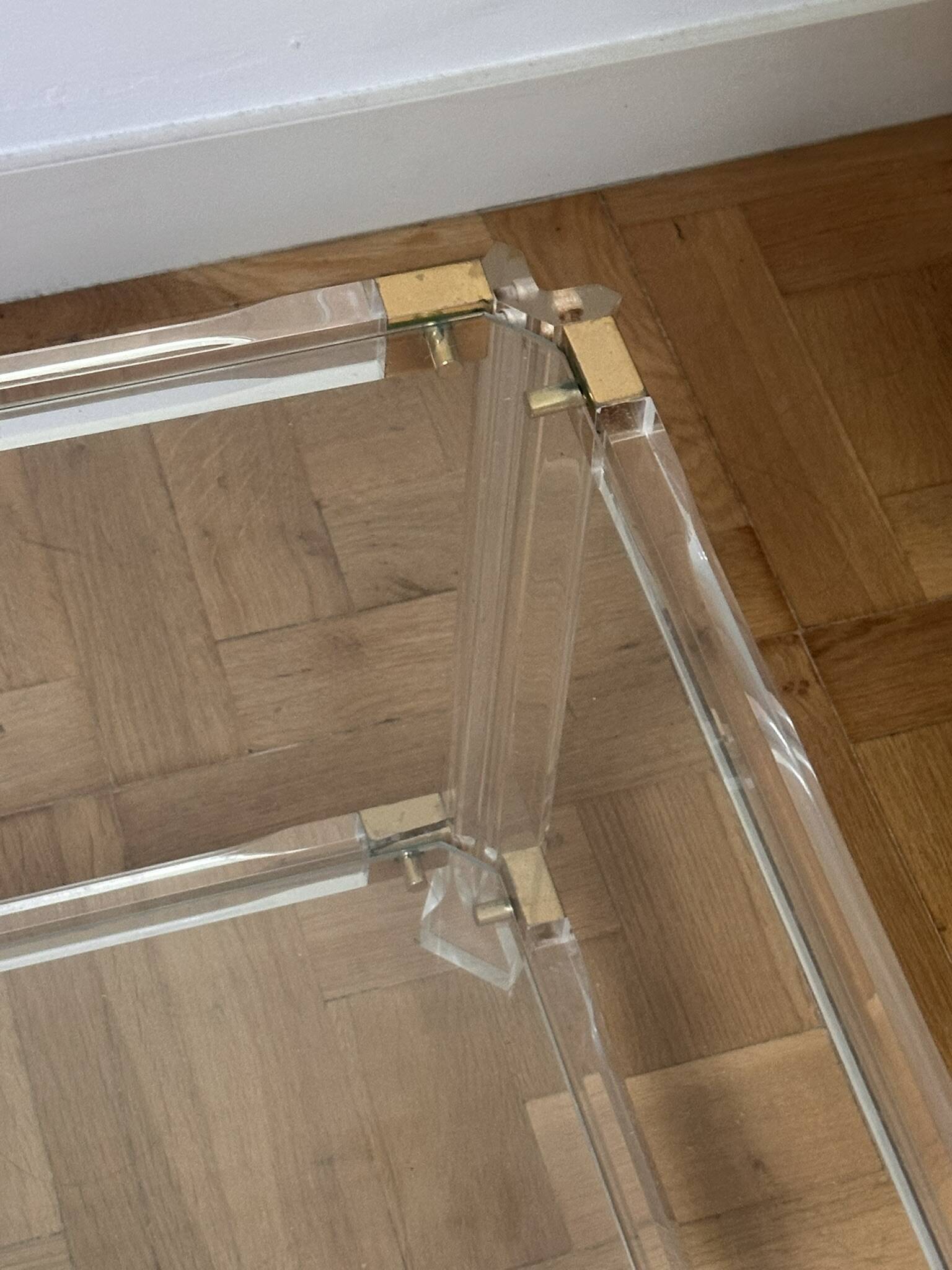 2 side tables in plexiglass, glass, and brass.