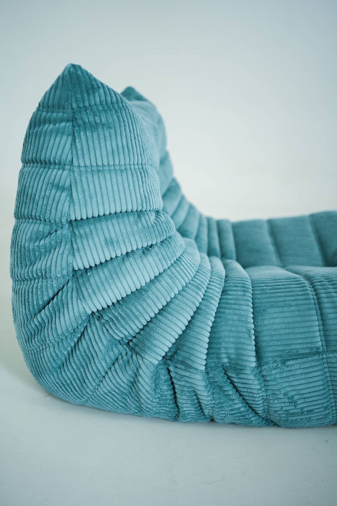Togo set of armchair and pouf in light blue corduroy