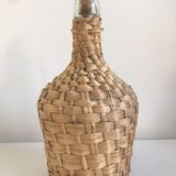 Old lady-jeanne dressed in vintage rattan