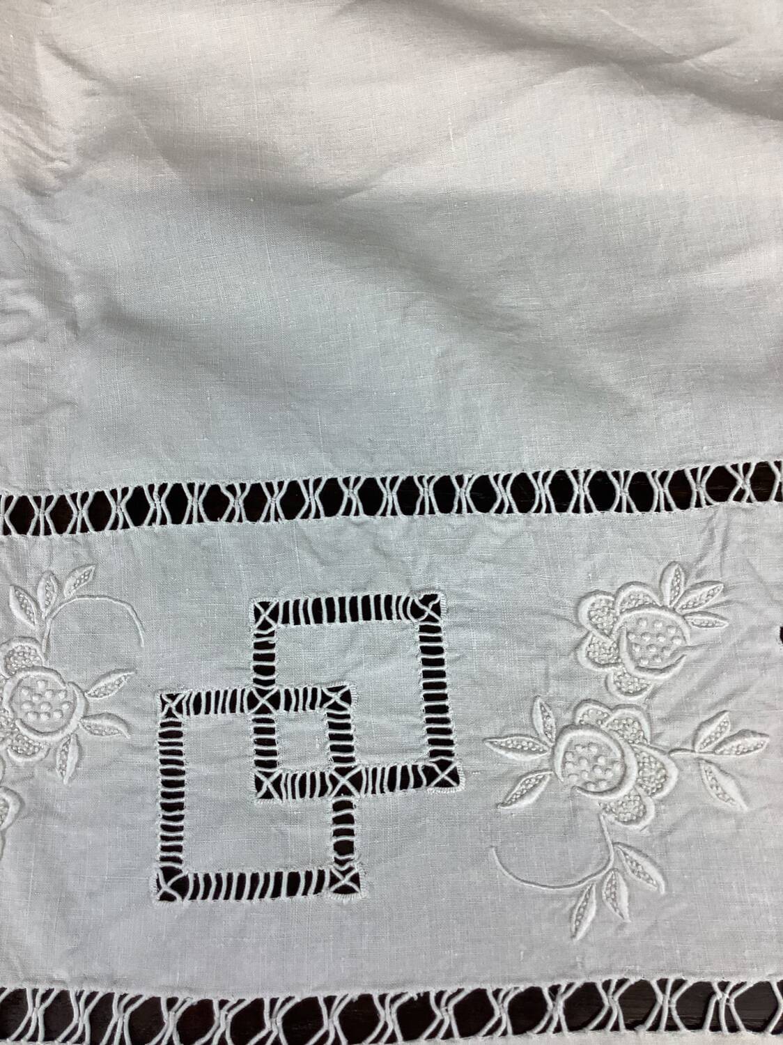 Old linen sheet with monogram embroidery