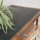 Vintage workshop folding table in oak with a hand-patinated black top.