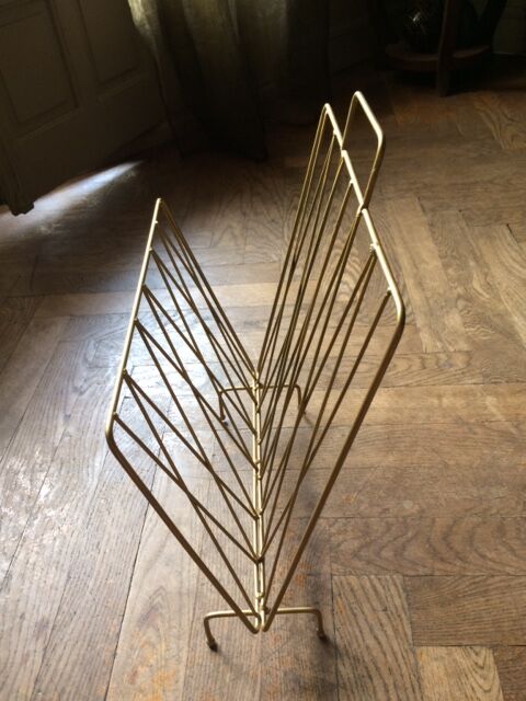 Gold metal magazine holder