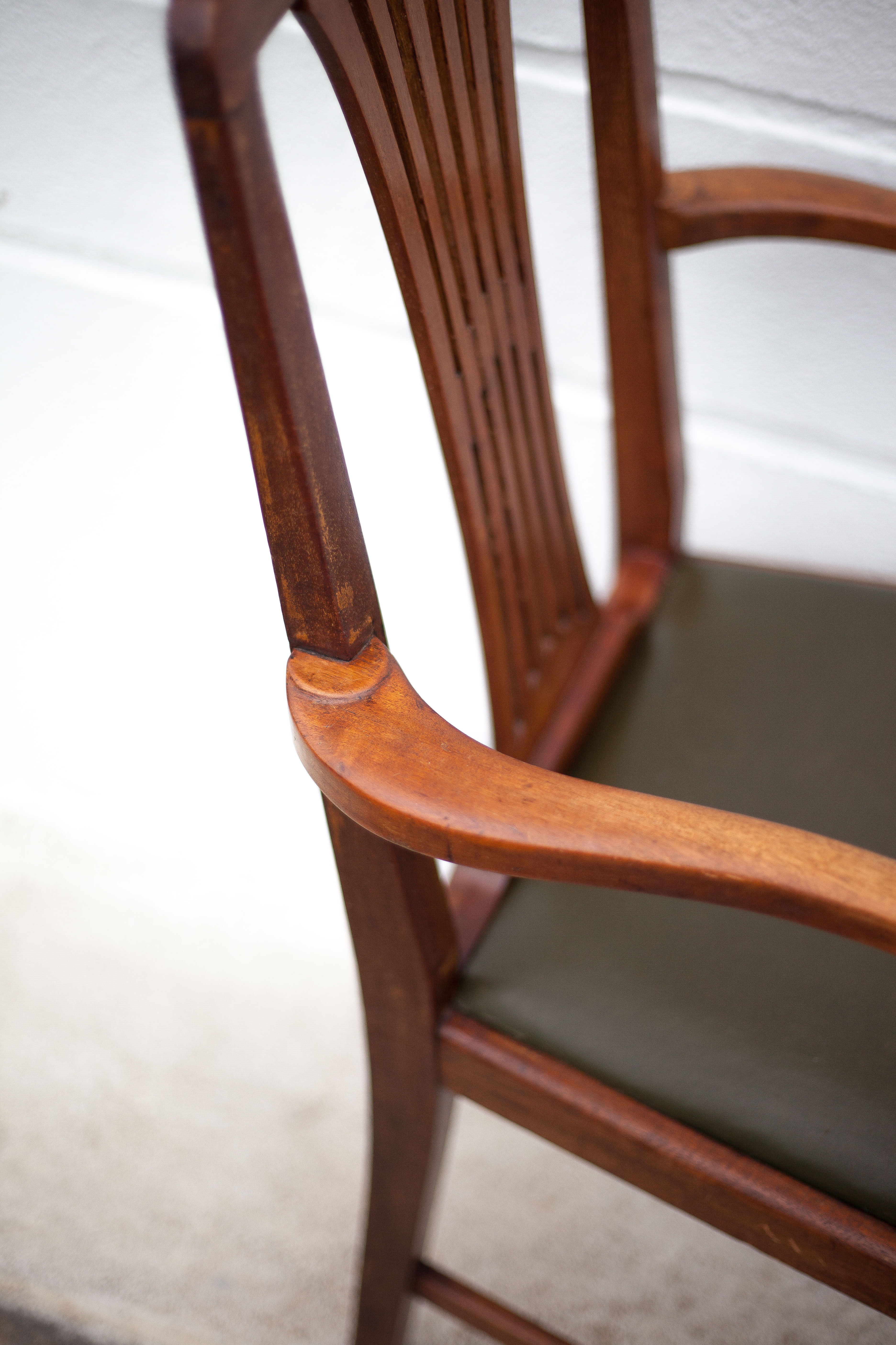 Art Nouveau armchair, wooden armchair with green leather seat, guimard style legs, living room, library