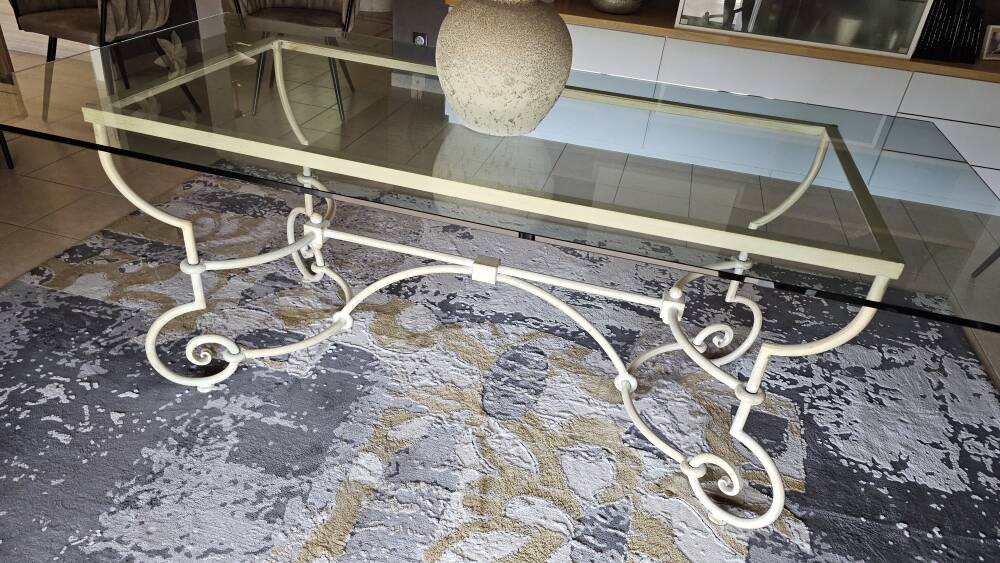 Wrought iron table by Roche Bobois, with a glass top.