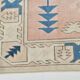 Tapis vintage en laine et coton pêche et bleu