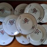 Set of 9 stencilled dinner plates