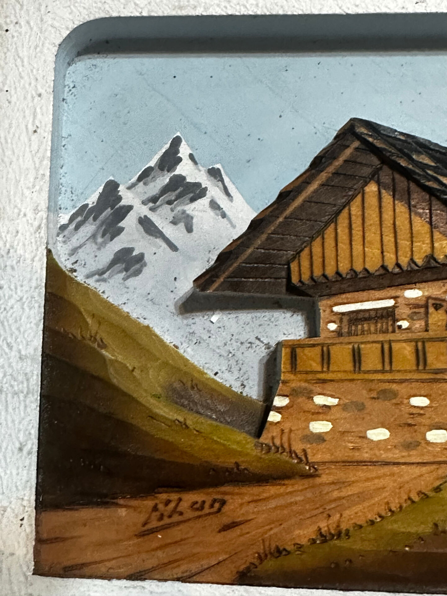 Carved and painted wooden Alpine panel signed 18 / 26 cm