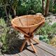 Basket on wooden and woven wicker legs 1950