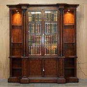 Theodore Alexander library in faux books in burl laurel.