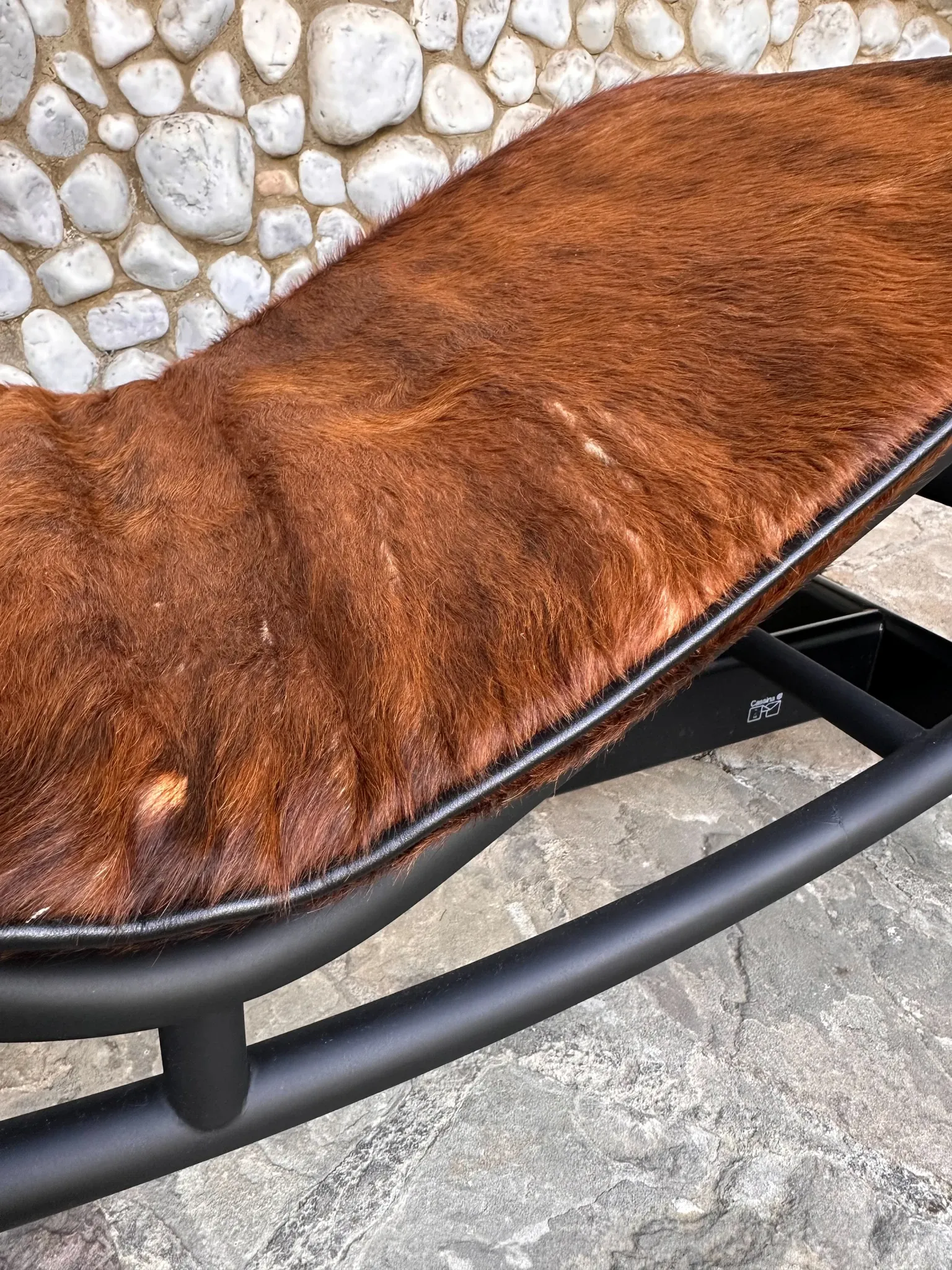 LC4 chaise longue in cowhide and black frame by Cassina, 1970–80
