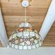 Vintage mother-of-pearl and brass pendant light.
