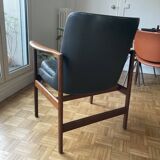 Scandinavian leather and wood armchair