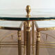 Round brass coffee table in neoclassical style