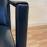 Set of 4 designer leather and metal armchairs.