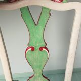 Chair with lyre backrest