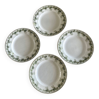 4 assiettes en terre de fer.
