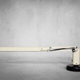 Beige plastic table lamp Lucifer, mid-century modern Scandinavian style.