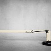Beige plastic table lamp Lucifer, mid-century modern Scandinavian style.