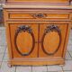 Napoleon III two-body buffet in mottled maple from the 19th century.