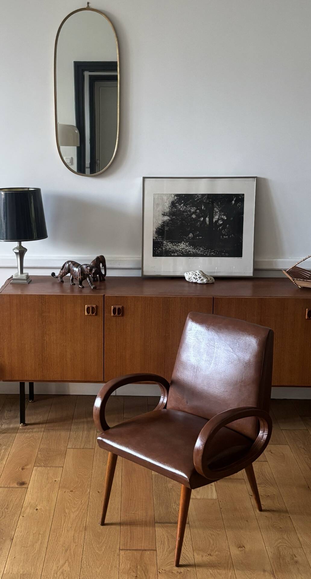 Modernist armchair with oval armrests, 1950s-1960s