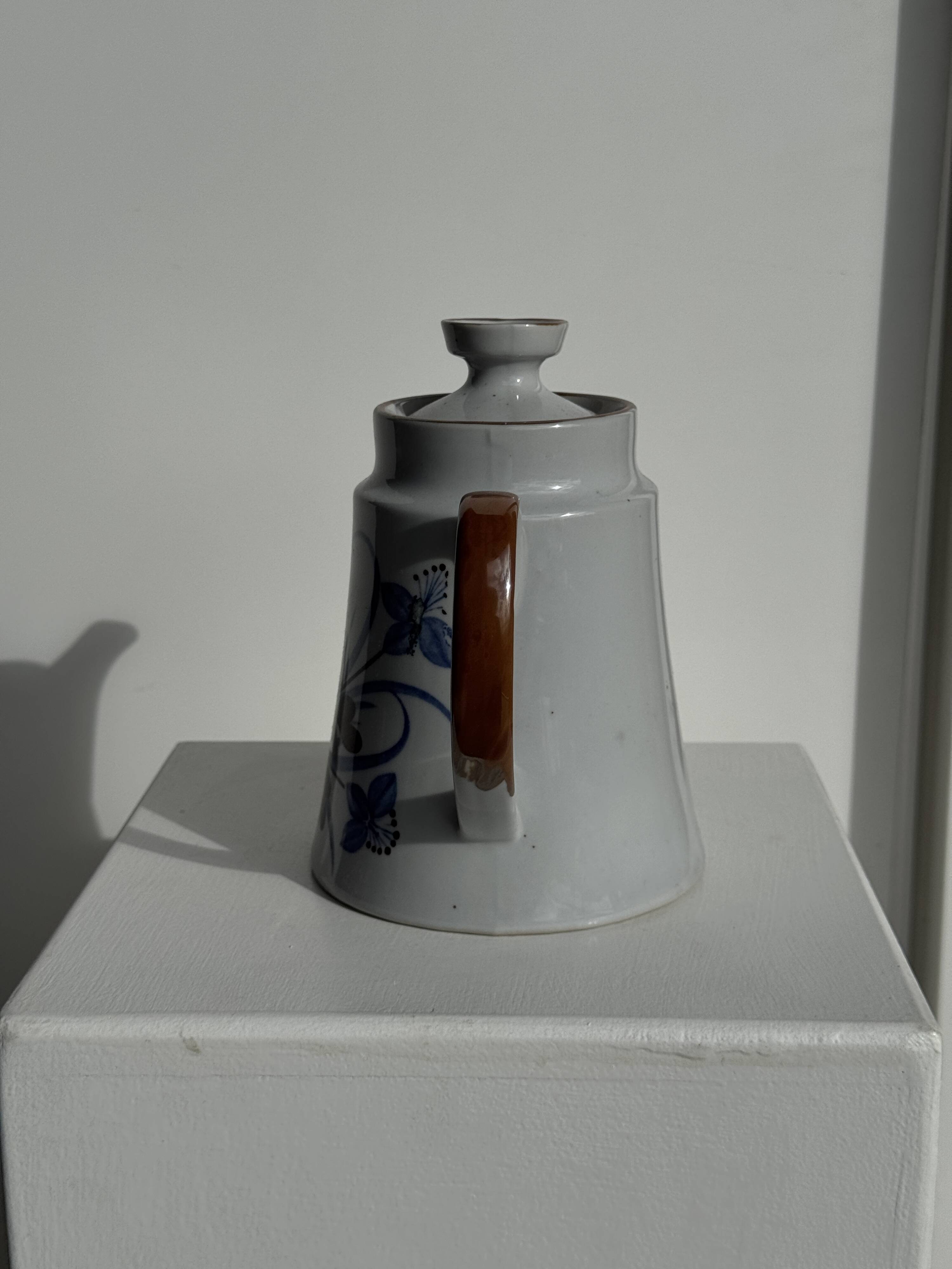 Teapot with stylised blue and brown flowers H18