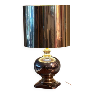 Beautiful ceramic base lamp with a golden metal shade.