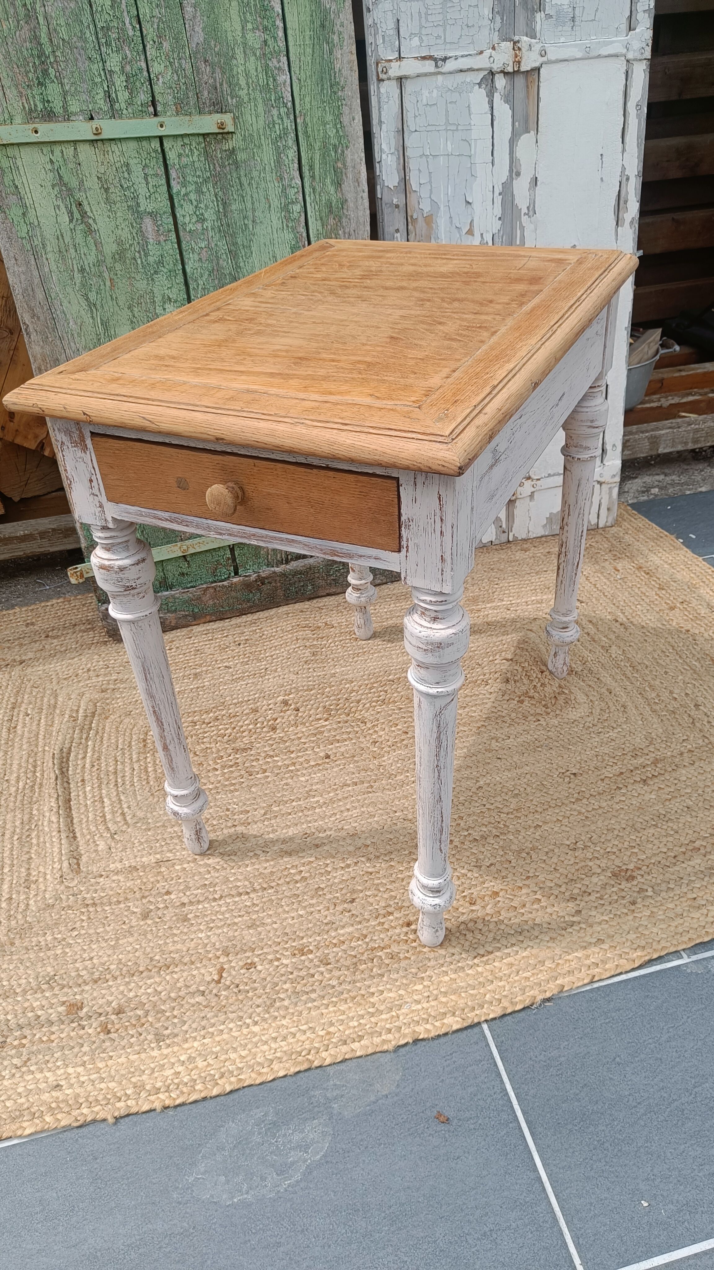 Antique drawer table with a patina.