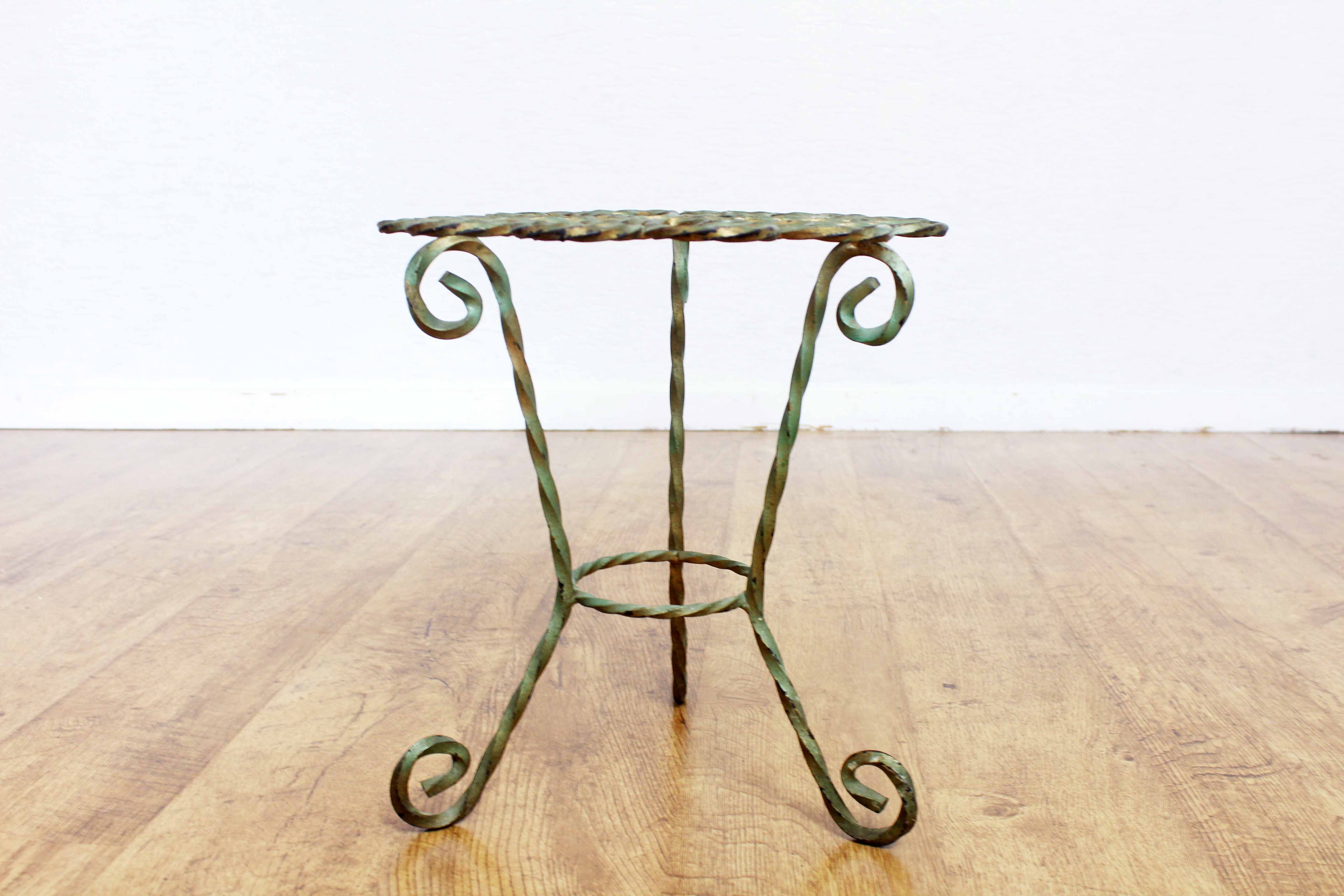 Wrought iron plant holder