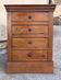 Small workshop cabinet with four drawers, mahogany finish and lined interiors.