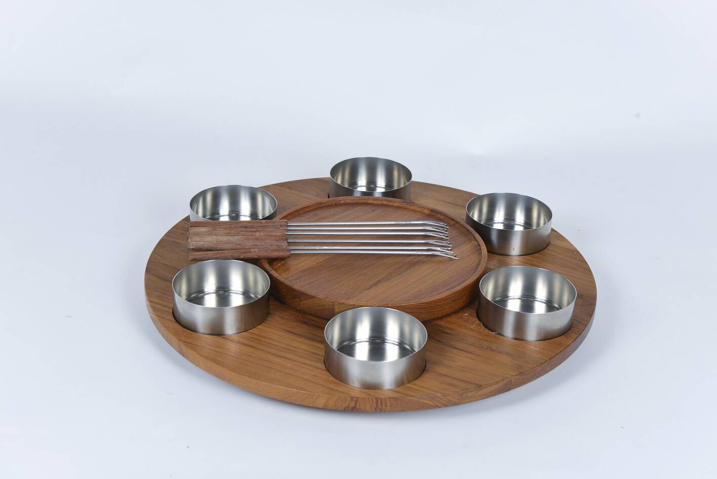 Turntable for fondue with its bowls. Lazy Susan Stelton