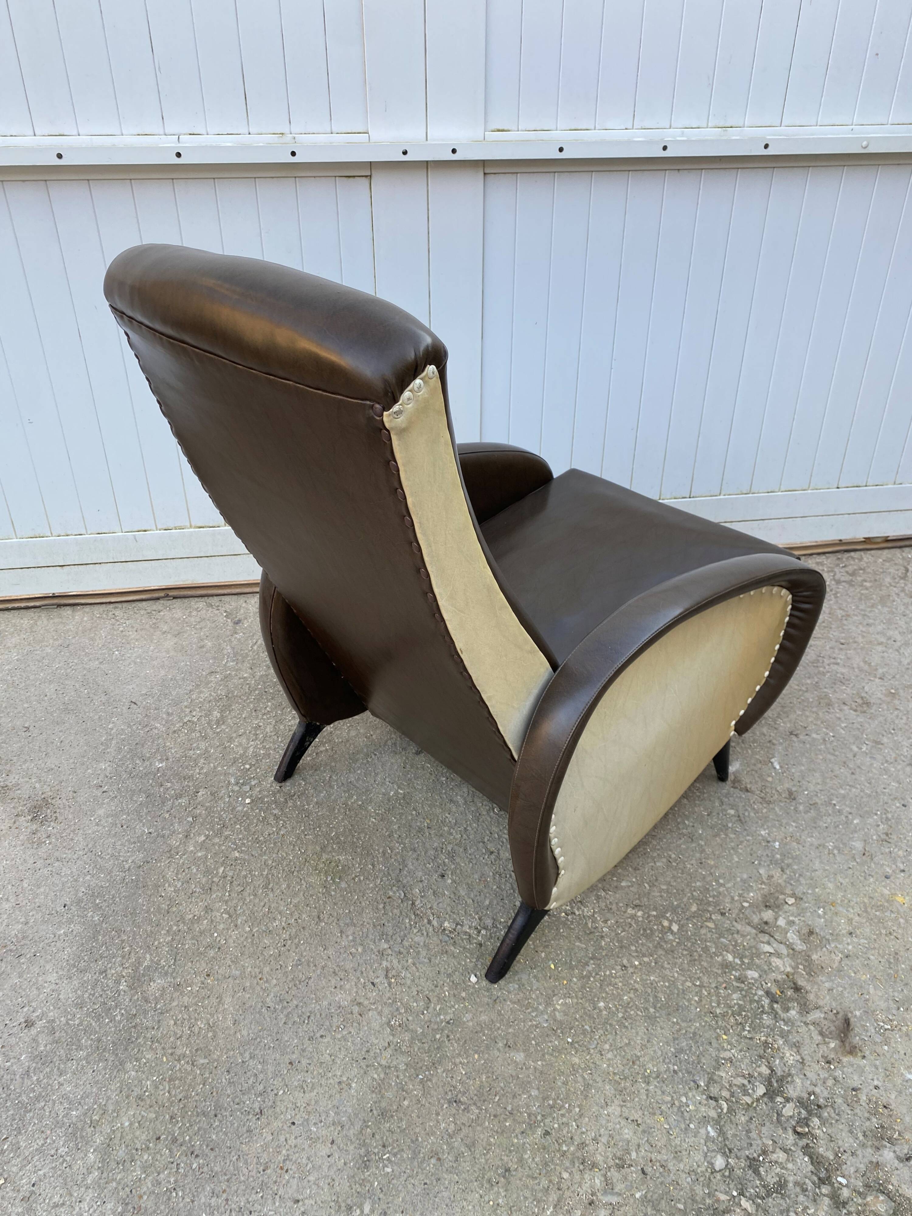 Vintage 50 faux leather reclining lounge chair with footrest