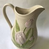 Barbotine pitcher with embossed tulip decoration and spike