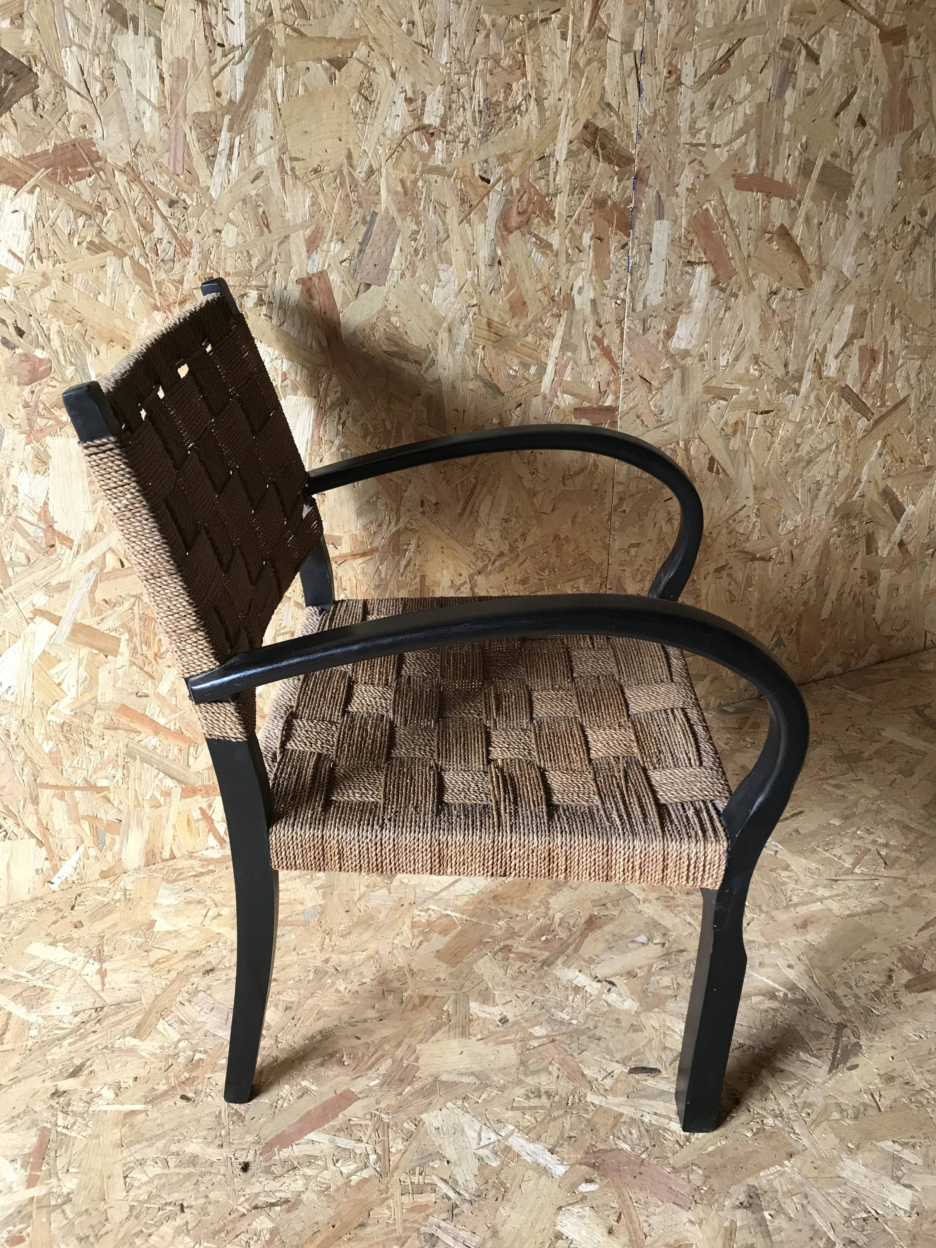 Vintage armchair with woven cord and wooden frame, Axel Larsson, circa 1960.