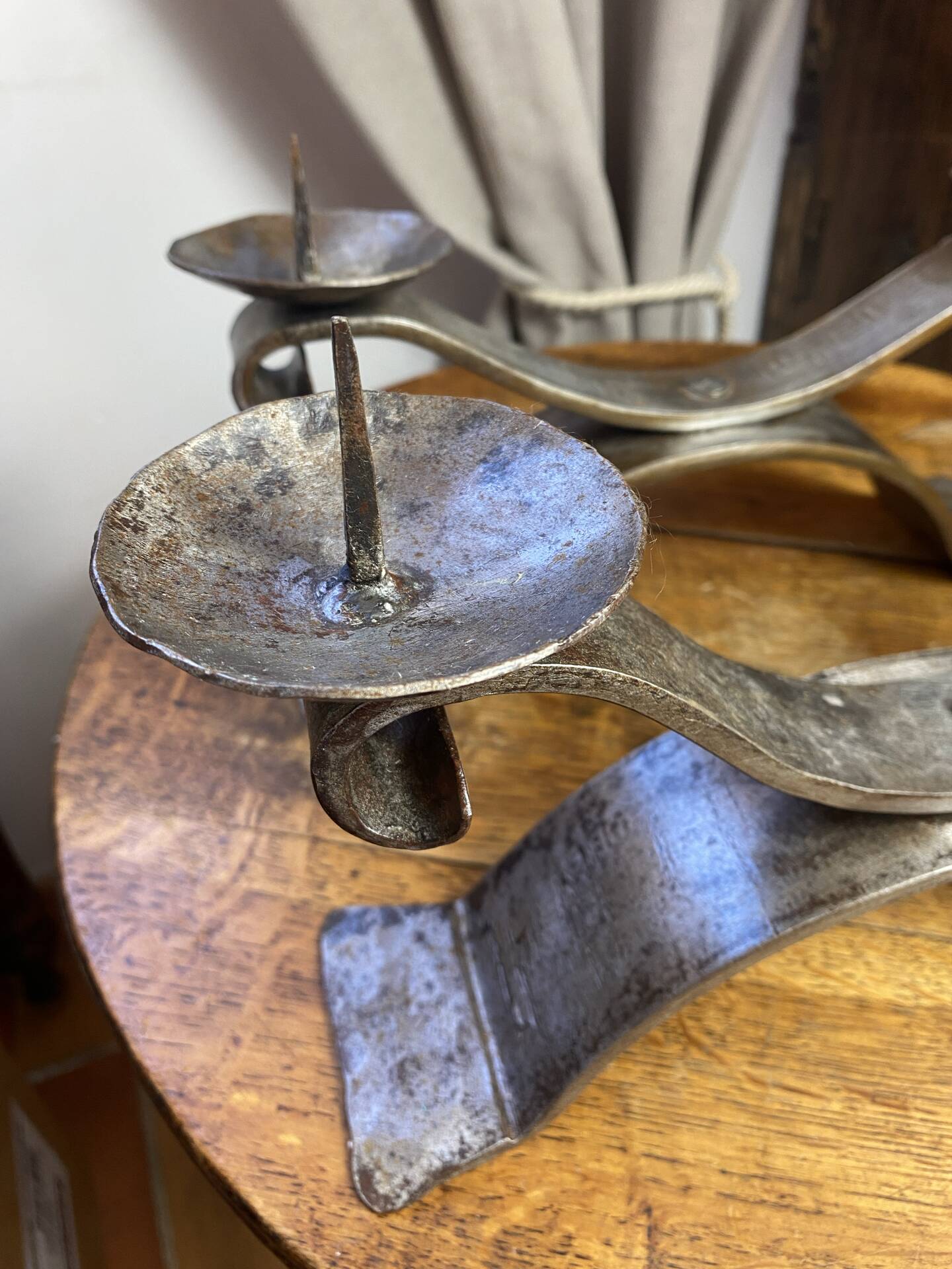 Brutalist wrought iron candlestick pair