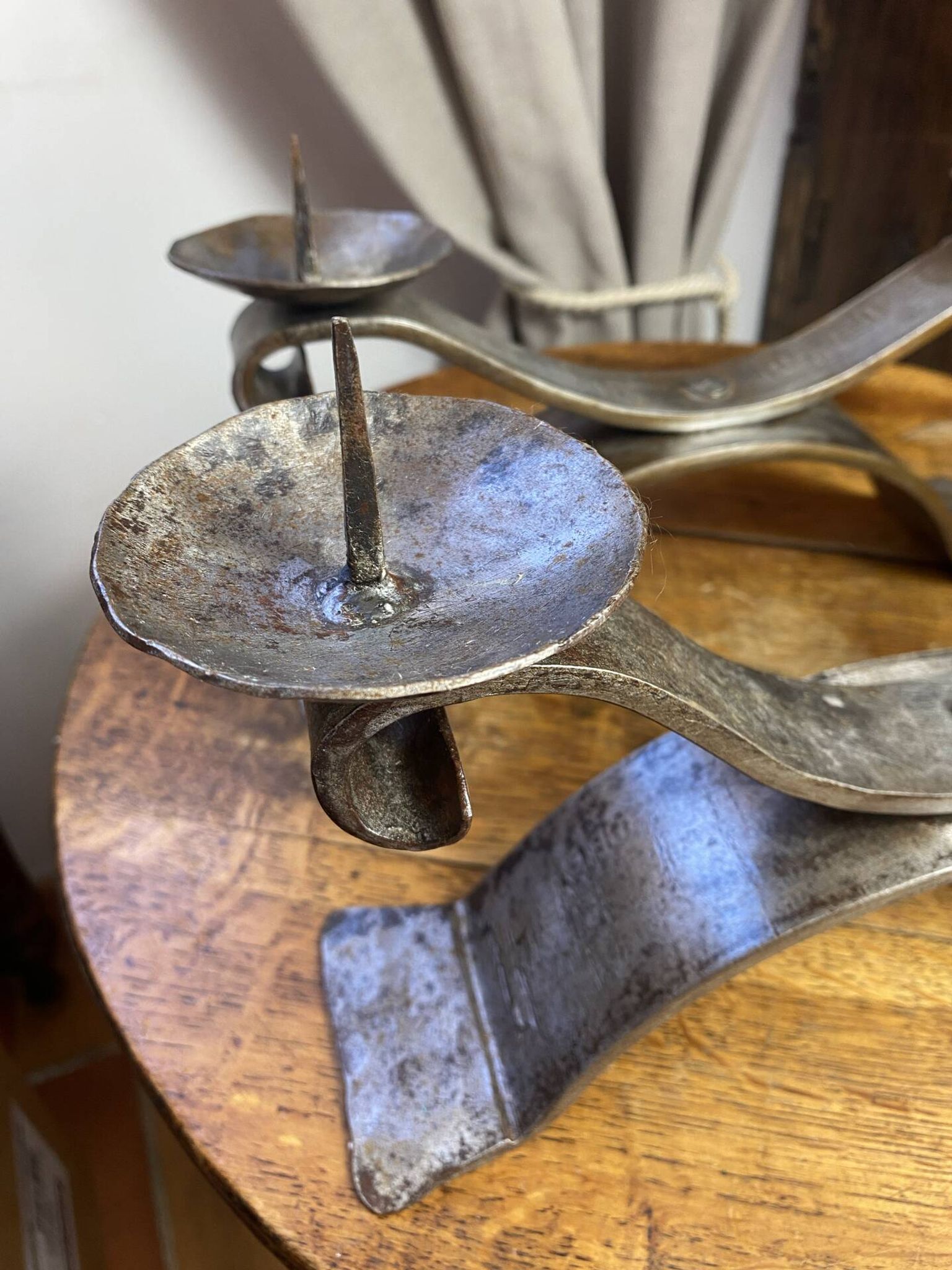 Brutalist wrought iron candlestick pair