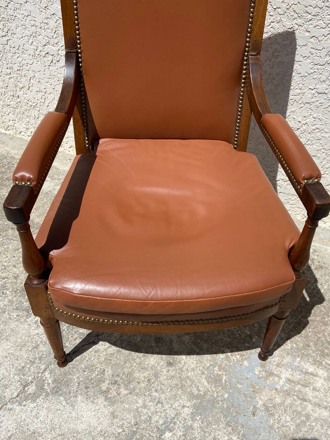 Wooden and leather armchair