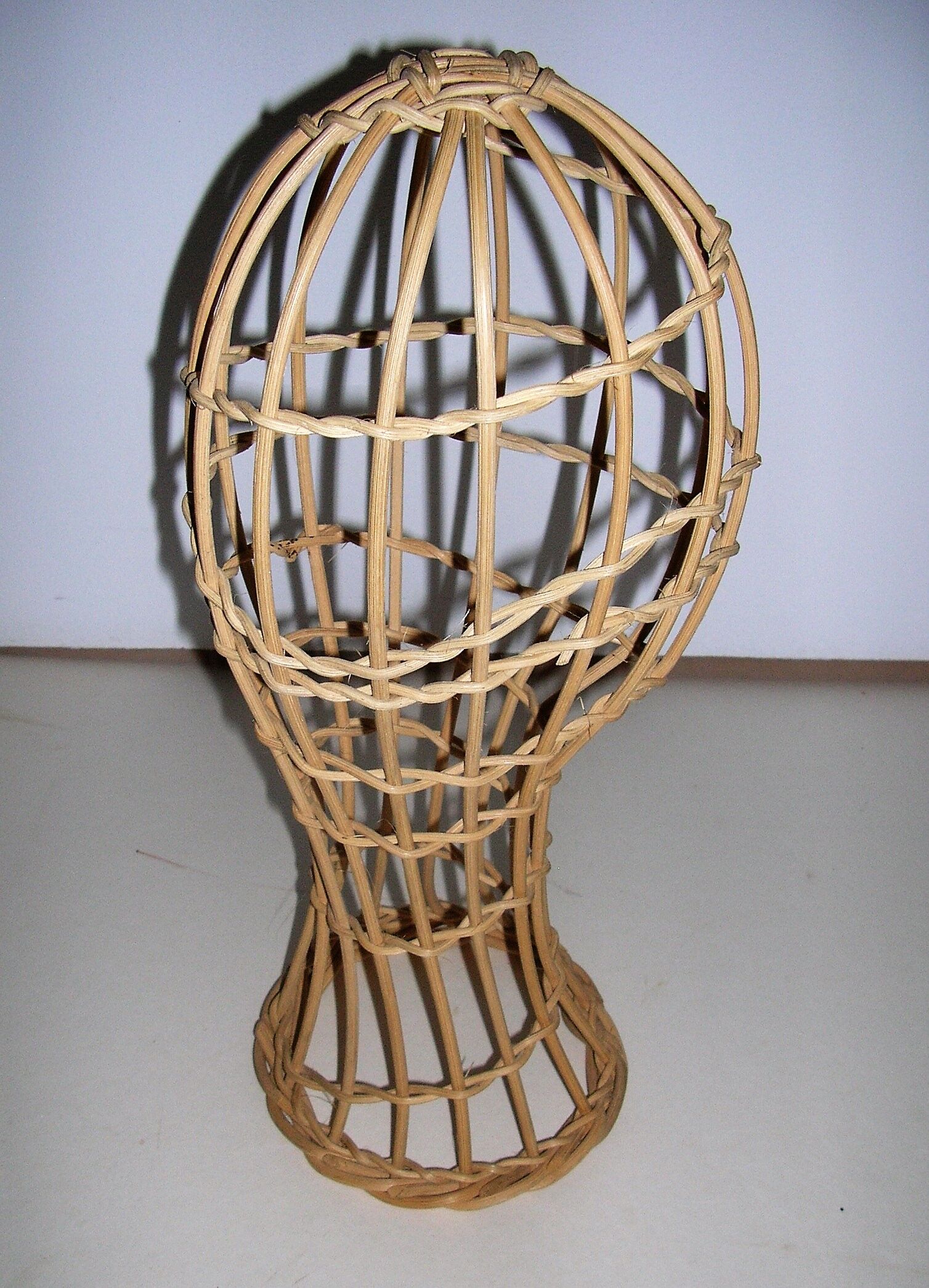 Model head in rattan